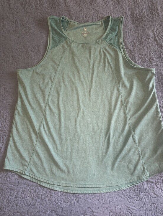 Spyder Tops - Spyder teal athletic tank top features breathable mesh panels on the shoulders.